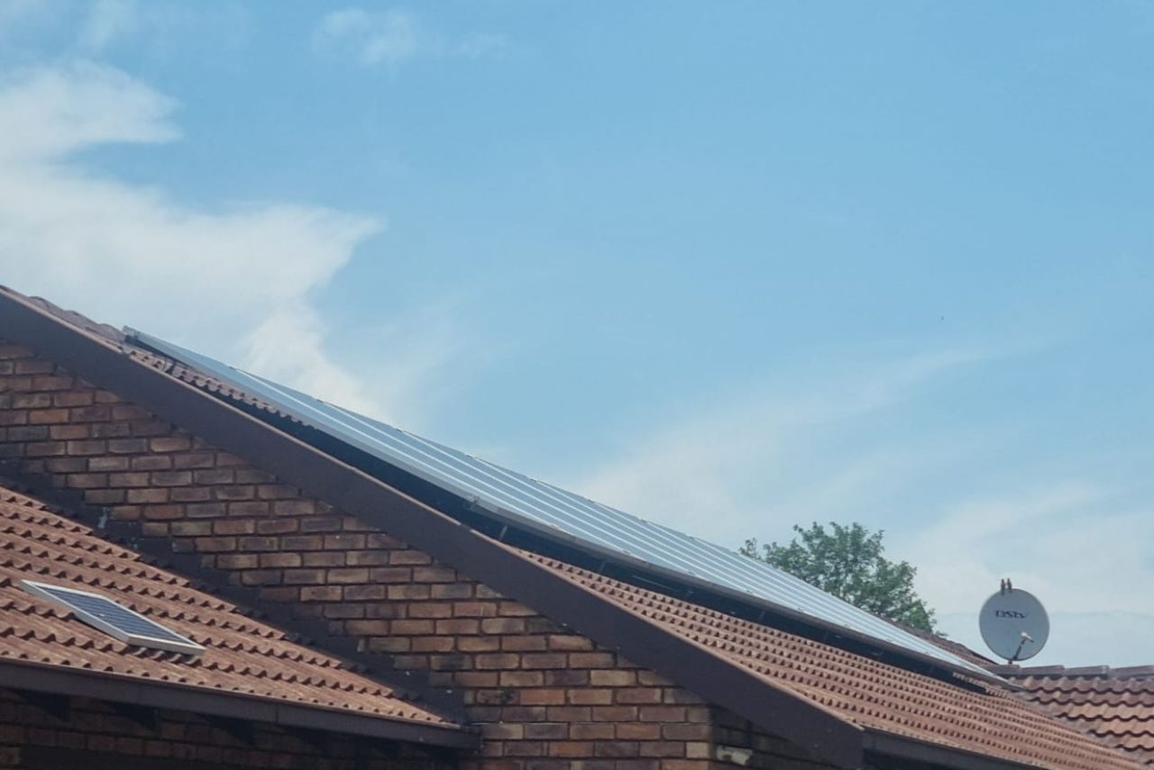 About SpotOn General Dealer – professional solar and backup power specialists. Solar panels installed on a residential roof for renewable energy generation