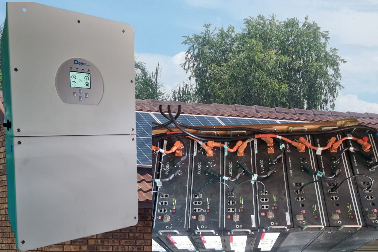 Full solar power system installation including inverter, battery storage and rooftop panels